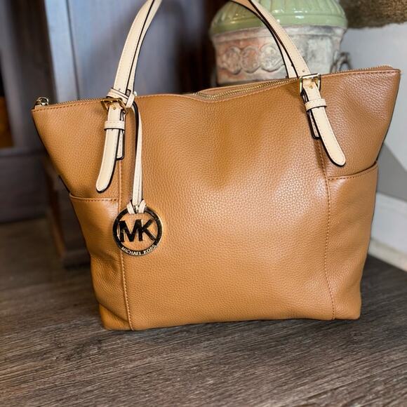 Michael Kors Handbags - Michael Kors Tan pebbles Leather Tote Bag great condition !